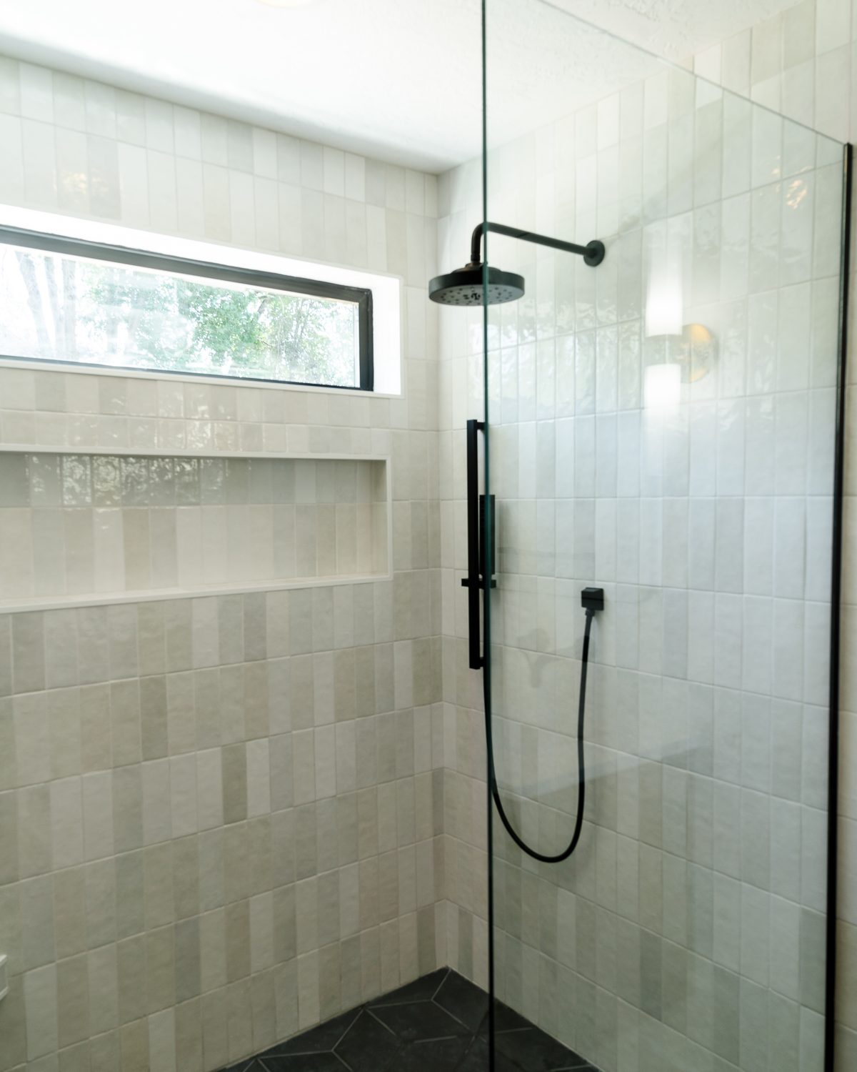 Master shower tile and fixtures