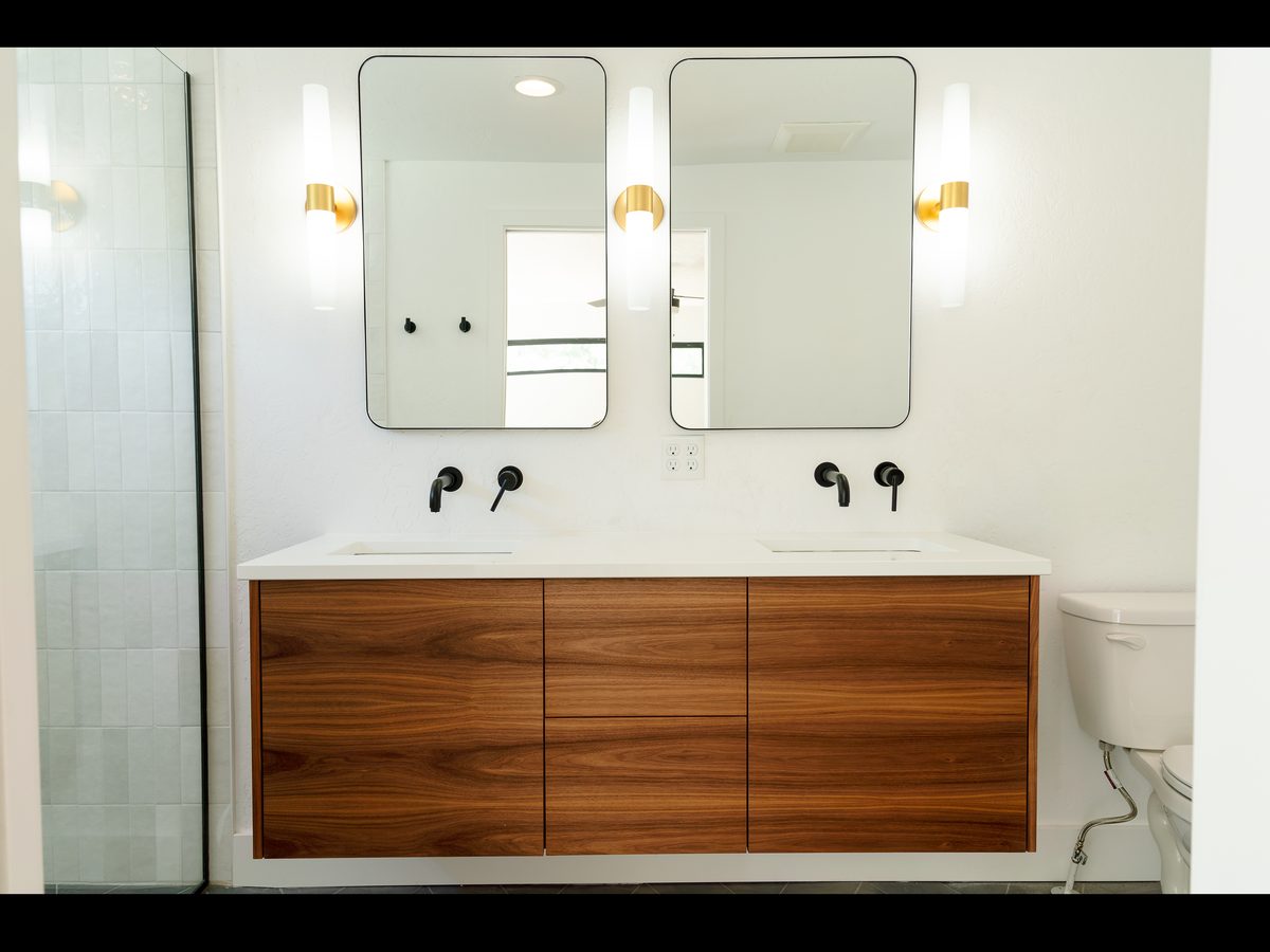 Floating grain-matched walnut double vanity, Boise bedroom addition